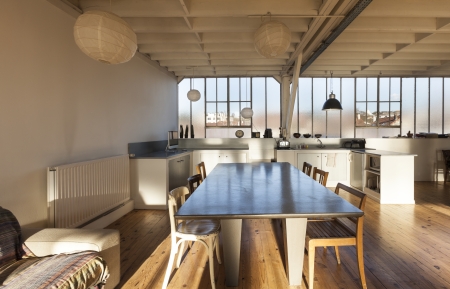 wide loft, beams and wooden floor の写真素材