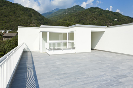 large terrace of a modern white houseの写真素材