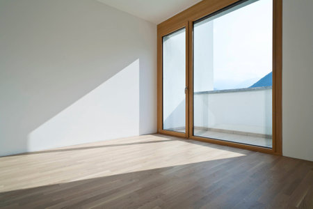 empty room with window and parquetの写真素材