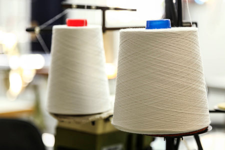 Industrial textile factory, two bobbins