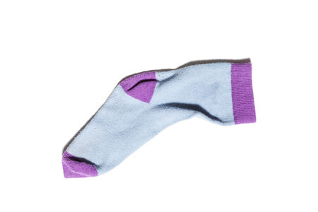 old sock, isolated on white backgroundの写真素材