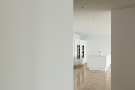 beautiful modern house, kitchen view from the passageの写真素材