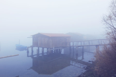 Typical Italian countryside of the po delta with fogの写真素材