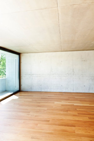 modern concrete house with hardwood floor, detail window