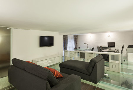 wide loft with modern furniture in studio