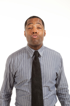 black man of african ethnicity, studio portrait, isolated on white backgroundの写真素材