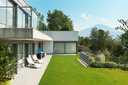 Architecture, modern white house with garden, outdoors Architecture, modern white house with garden, outdoors