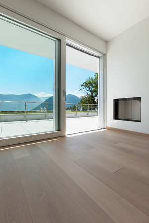 Interior, corner of a modern apartment, view fireplace and windowの写真素材
