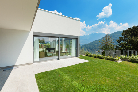 Architecture, modern white house with garden, outdoors Architecture, modern white house with garden, outdoors