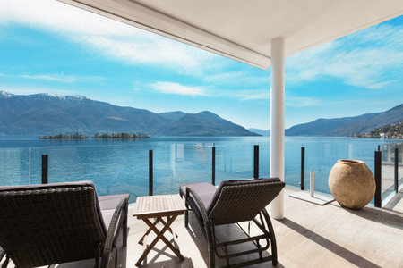modern architecture, beautiful lake view from the terrace of a penthouseの写真素材