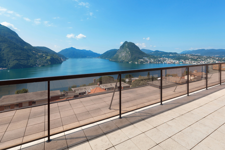panoramic view of Lake Lugano in a summer dayの写真素材
