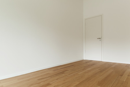 interior of new apartment, empty room with wooden floorの写真素材