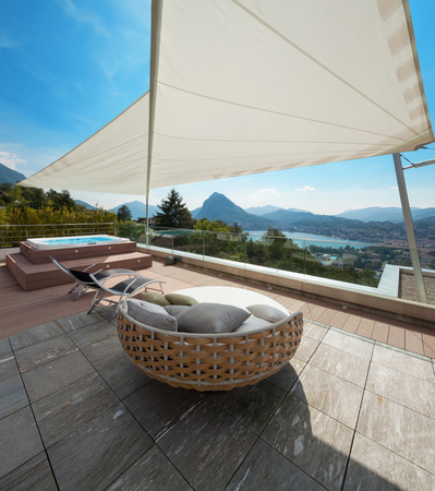 modern penthouse, beautiful panorama from a terrace, lake viewの写真素材