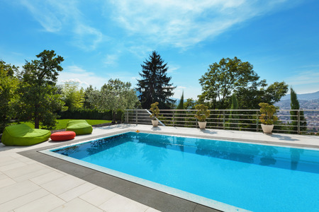 beautiful house, swimming pool nobody inside, summer dayの写真素材