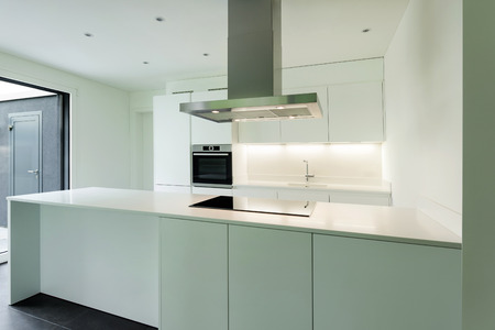 interior of new apartment, white domestic kitchenの写真素材