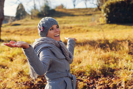 Girl in the countryside in the autumn campaignの写真素材