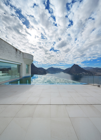 beautiful landscape from a modern house with infinity poolの写真素材