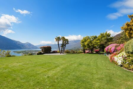 beautiful view of the Lake Maggiore from the garden of a villaの写真素材