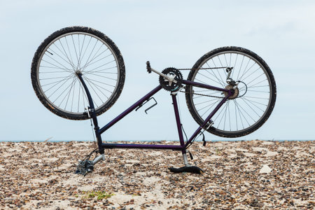 bike upside down on the beach