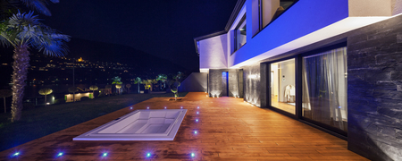 Exteriors of modern luxury villa in the nightの写真素材