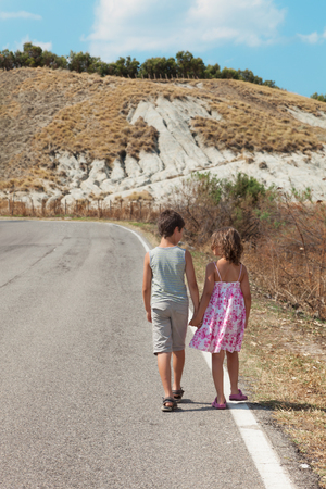 portrait of two children on the road, rea viewの写真素材