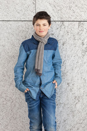 portrait of a casual teen boy, outdoorsの写真素材