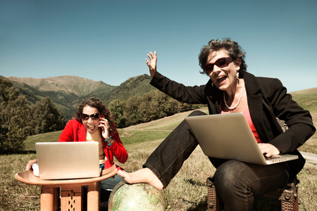 portrait of two business women in the countrysideの写真素材