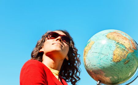 portrait of a woman with the globeの写真素材