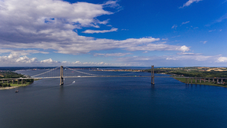 New Little Belt Bridge and small town of Middelfart seen from aerial viewの写真素材