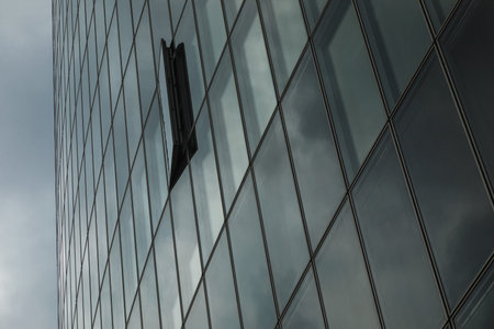 Modern glass building with open window