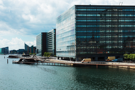 Modern buildings on the riverの写真素材