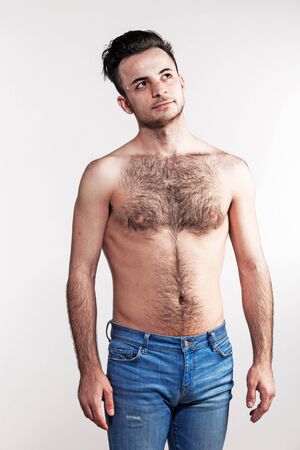 Boy with naked hairy chestの写真素材