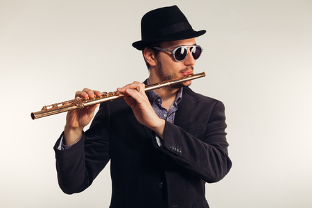 Portrait studio musician with his musical instrument.の写真素材