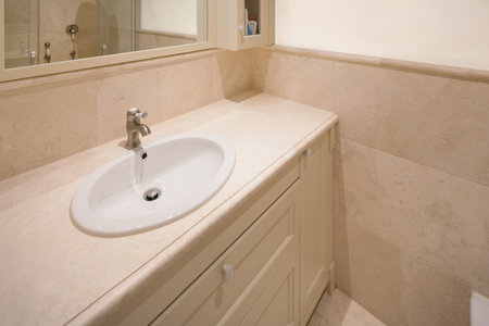 Marble bathroom well finishes. White wall
