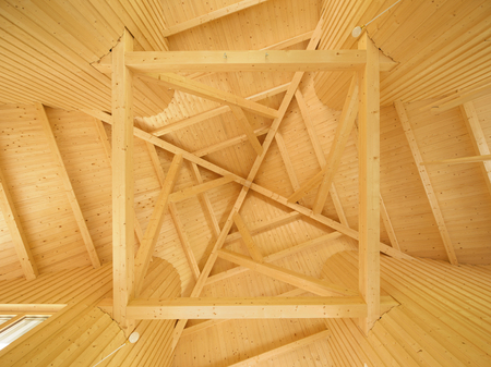 Wooden ceiling with exposed beamsの写真素材