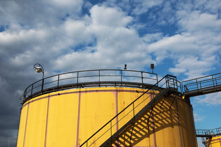 Industrial area in Wien with yellow cisternの写真素材