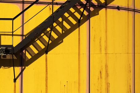 Industrial area in Wien with yellow cisternの写真素材