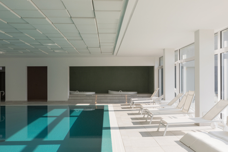 Covered swimming pool in a private residence overlooking the garden. nobody insideの写真素材