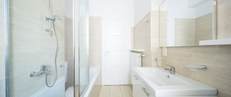 Modern empty bathroom illuminatedの写真素材