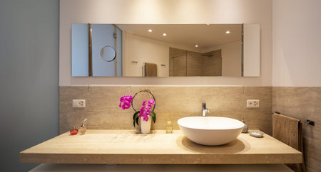 Modern bathroom with wood and marble finishes, elegant bathroom. Nobody inside