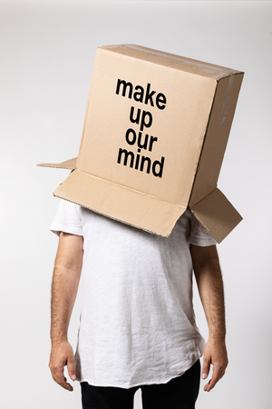 Man with box on his head, make uo our mind. Conceptの写真素材