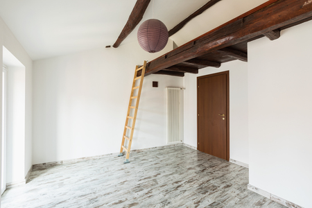 Empty white room with wood beams. Nobody insideの写真素材