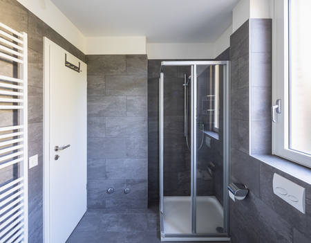 Elegant bathroom with dark tiles. Nobody insideの写真素材