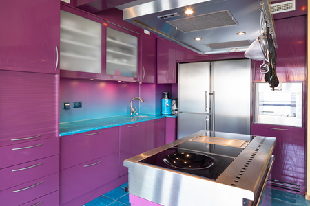 Modern elegant purple and blue kitchen in a luxury apartment. No one insideの写真素材
