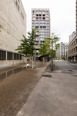 Urban landscape in Zurich with modern wooden roof and skyscrapers in the distance. Cloudy day. There isn't nobodyの写真素材