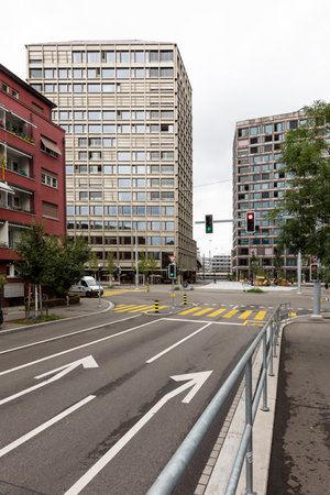 Urban landscape in Zurich with modern wooden roof and skyscrapers in the distance. Cloudy day. There isn't nobodyの写真素材