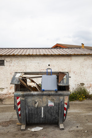 Large open trash cans with garbage strewn everywhere, it's just rudeness. Front view detailの写真素材