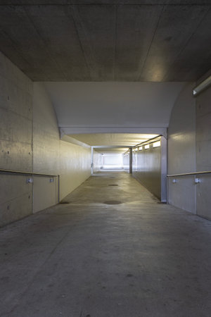Concrete pedestrian underpass passing under the train station in Mendrisio, Switzerland. Nobody...