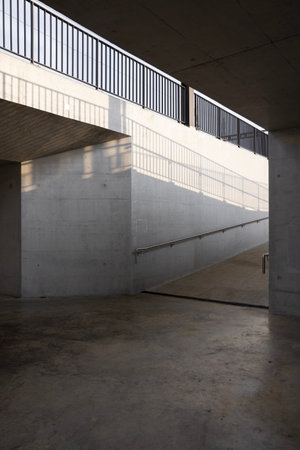 Detail of the ramp inside the concrete station with large concrete walls. No one insideの写真素材