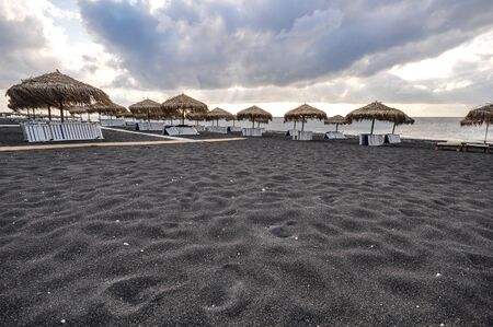Black beach in Santoriniの写真素材